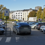 Tesla Says Their Supervised Full Self-Driving Will Automatically Find a Free Spot Even in a Busy Parking Lot & Park Itself